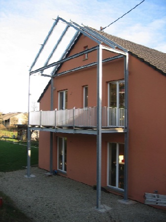 Balkonanbau an ein Haus. Mit Dachscheiben aus VSG Glas
